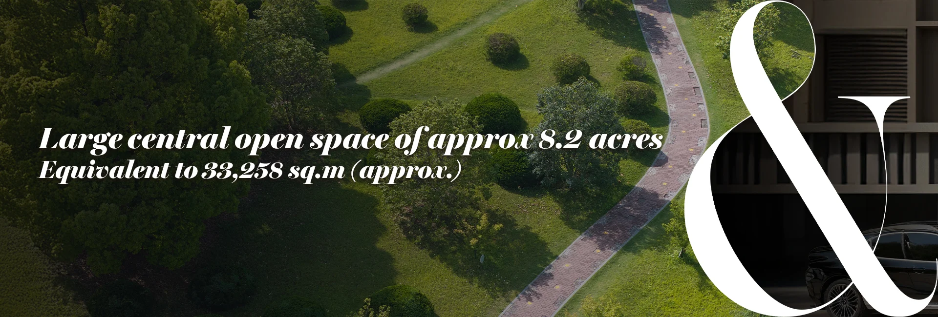 Large central open space with curving walkway and landscaped trees of approx. 8.2 acres