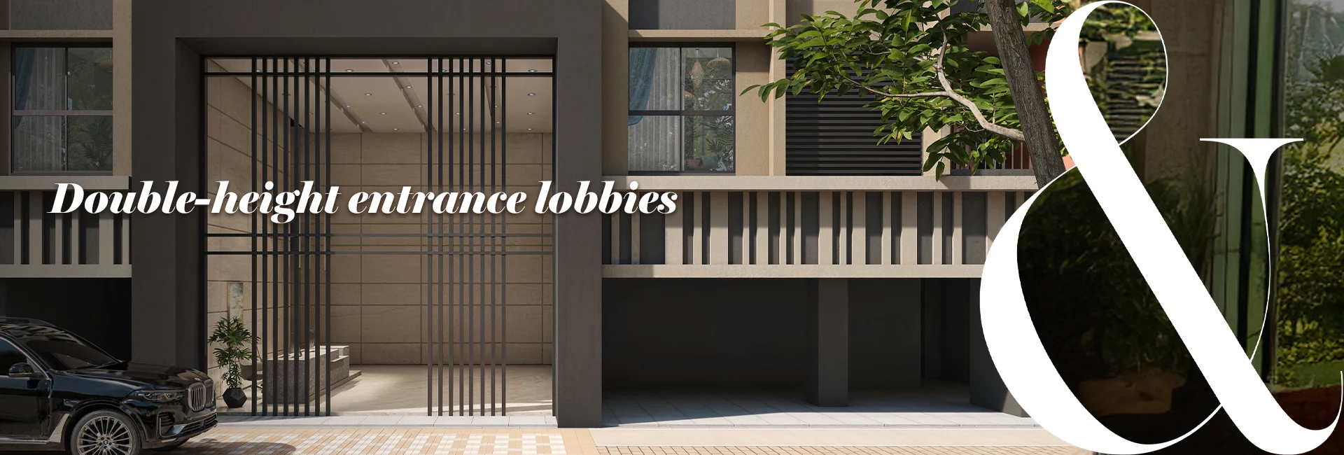 Double-height entrance lobby with chandelier, lounge seating, and circular bar