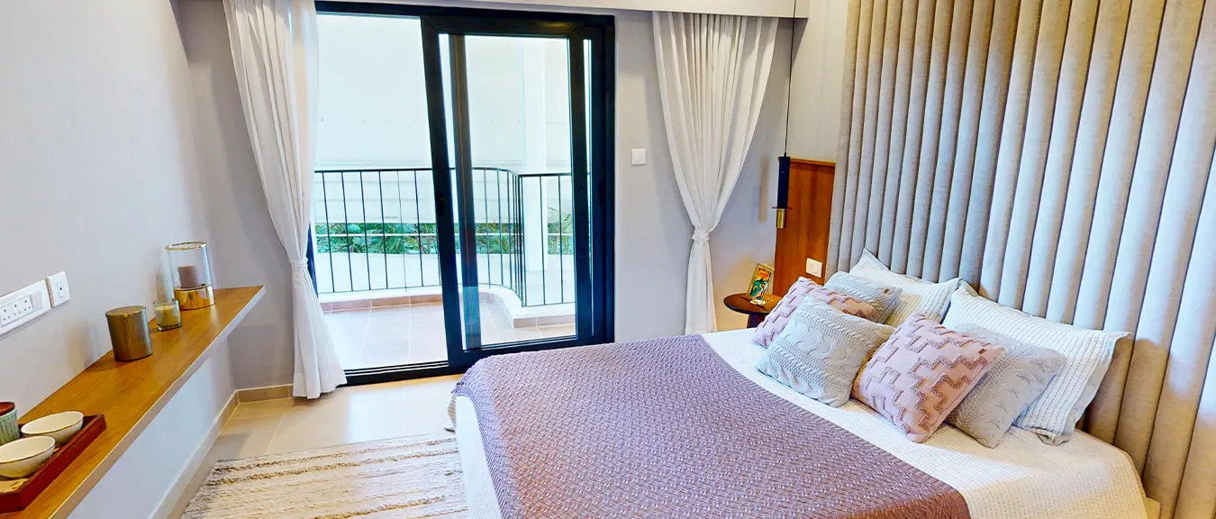 Birla Trimaya Pune 4 – luxurious bedroom with modern interiors, large windows & scenic views offering premium living experience.
